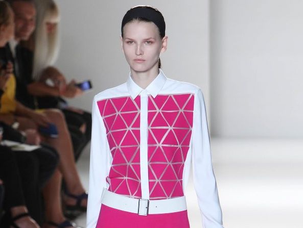 Victoria Beckham uses pops of fuchsia for effect. Victoria Beckham uses pops of fuchsia for effect.